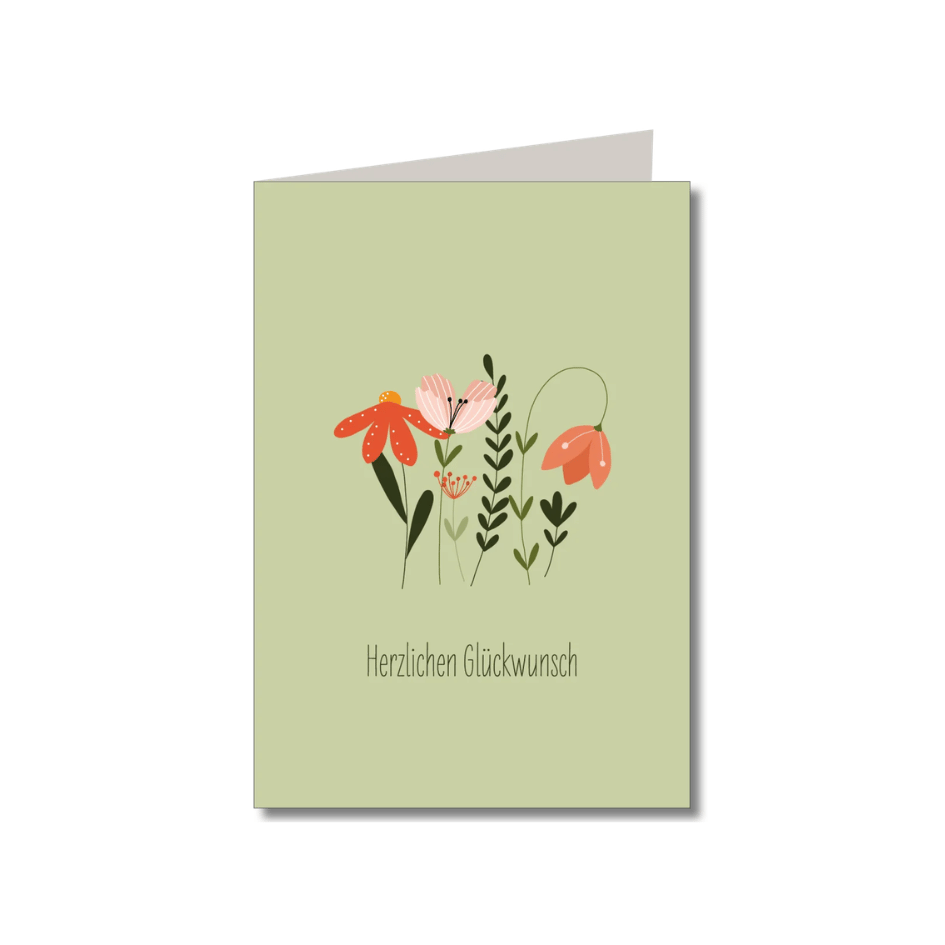 Grüne Klappkarte von Keitcards „Herzlichen Glückwunsch“ von Keitcards mit buntem Blumenmotiv und braunem Naturpapier-Umschlag.