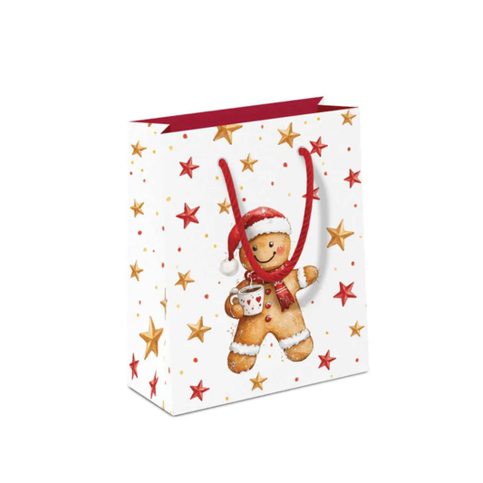 Ambiente Geschenktüte Cocoa and Cookie aus Papier mit Lebkuchenmann, roter Weihnachtsmütze, roten und goldenen Sternen sowie roten Kordelhenkeln.