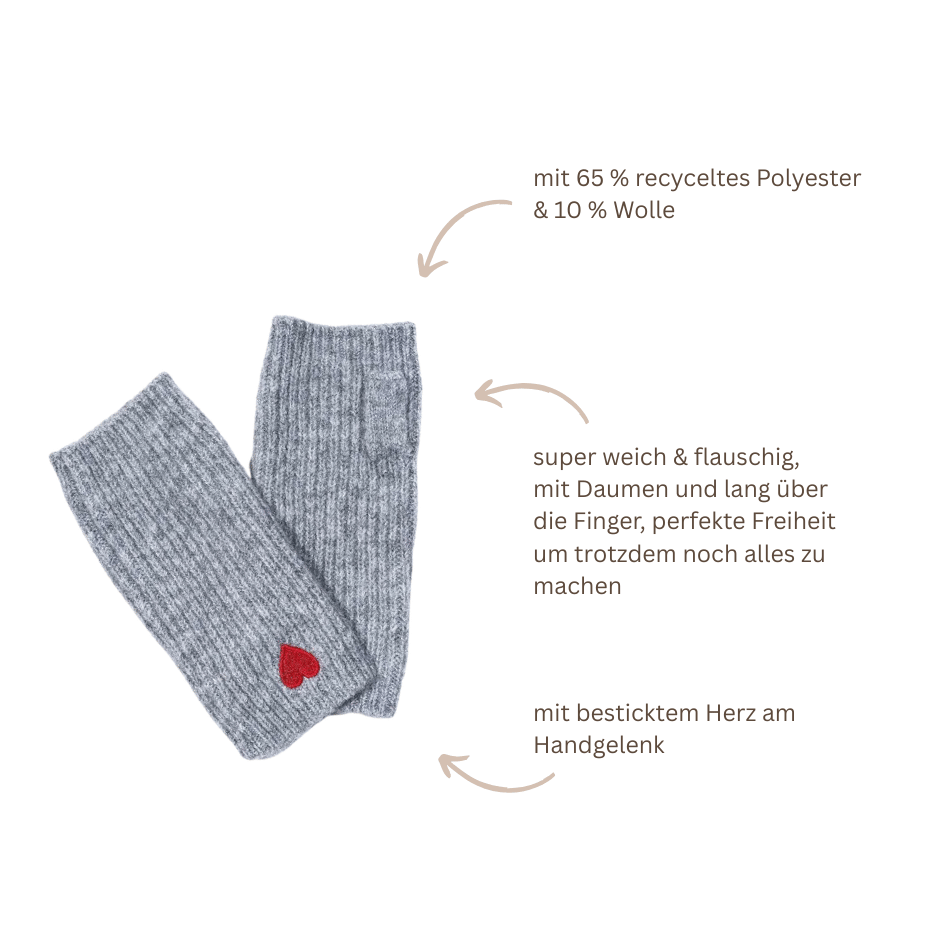 Graue Damen Handstulpen mit Daumenöffnung und kleinem roten Herz am Handgelenk, weich und flauschig für Herbst und Winter.