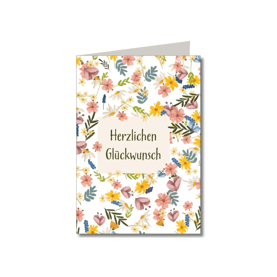 Klappkarte „Herzlichen Glückwunsch“ von Keitcards mit buntem Wildblumen-Design und Naturpapier-Umschlag.