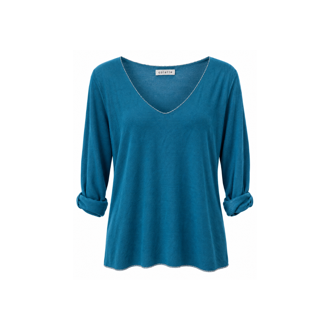 Petrolblaues Damen-Langarmshirt aus Angora, Wolle und Viskose mit V-Ausschnitt und leicht schimmernden Lurex-Details an Ausschnitt und Saum.