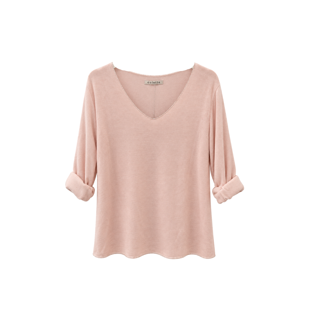 Rosa Damen-Langarmshirt aus Angora, Wolle und Viskose mit V-Ausschnitt und leicht schimmernden Lurex-Details an Ausschnitt und Saum.