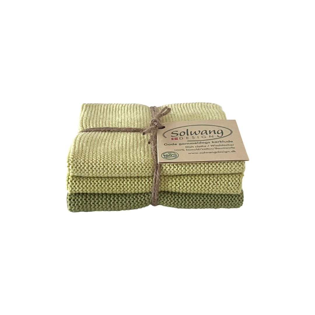 3er-Set gestrickte Wischtücher in Pistazie und abgestuften Grüntönen aus 100 % BIO Baumwolle, mit Schnur und Etikett gebunden.